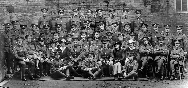 Theo Randall, seater in front row, second from right.